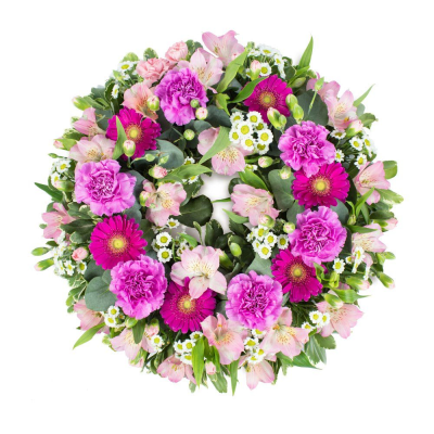 Wreath SYM-320 - A classic wreath in shades of pink finished with fine foliage. Wreath SYM-320 - A classic wreath in shades of pink finished with fine foliage.